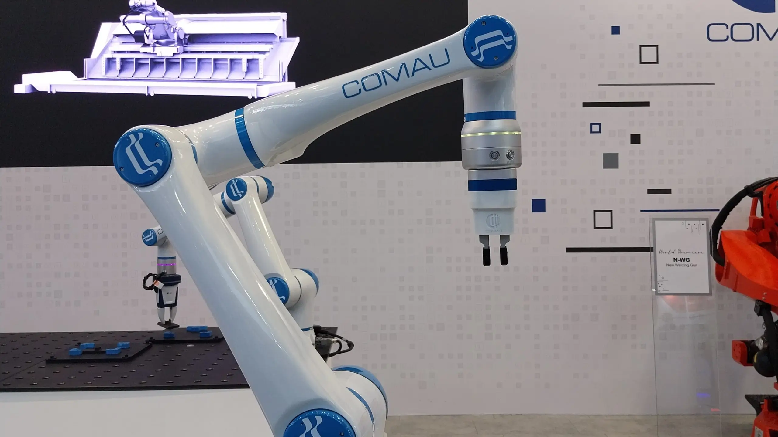 Comau MyCo collaborative robot arm shown in an industrial automation demonstration