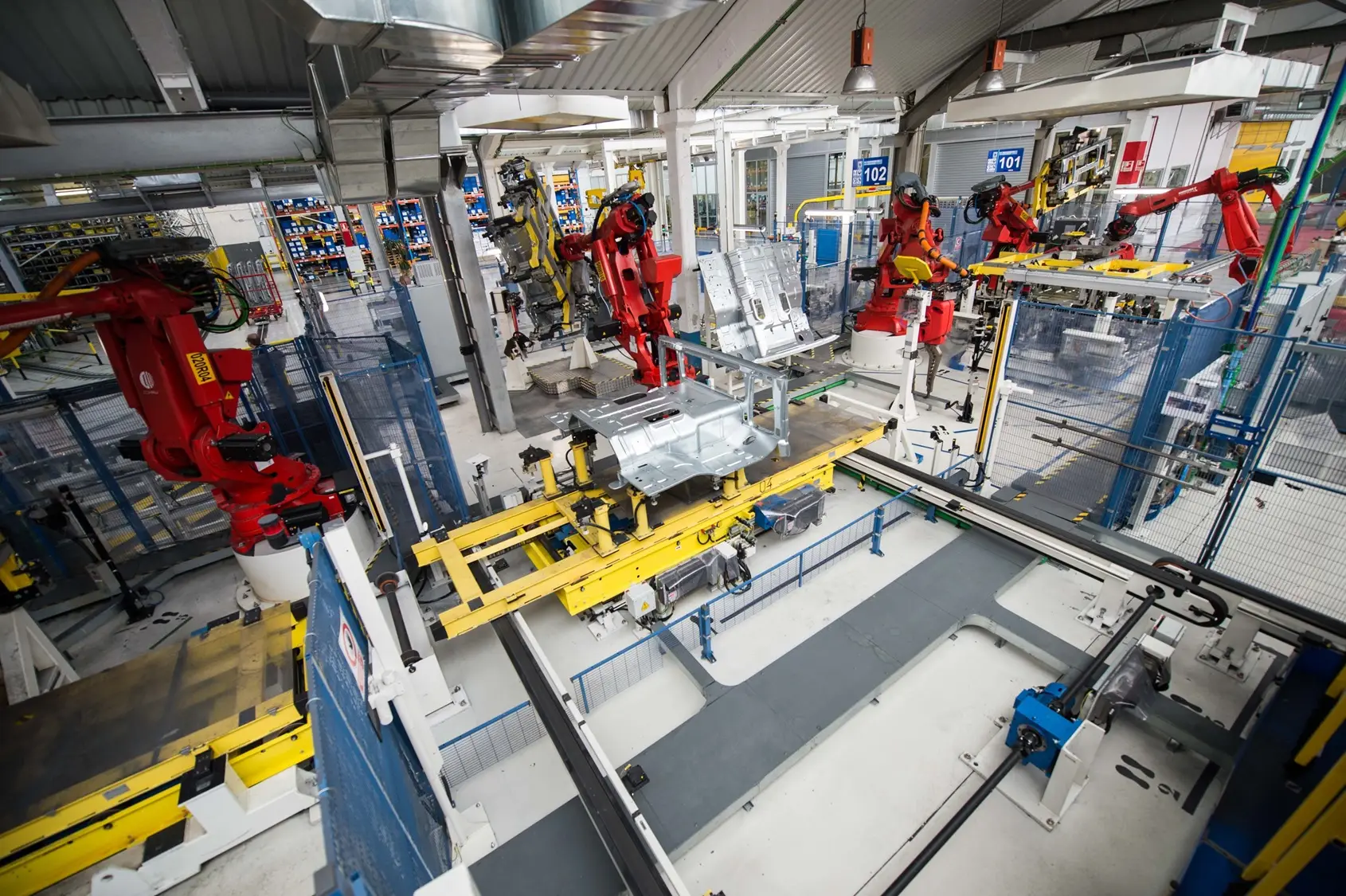 COMAU industrial robots working on an IVECO Valladolid assembly line